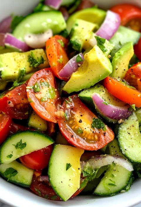 Tomato Cucumber Avocado Salad With Fresh Lemon Dressing